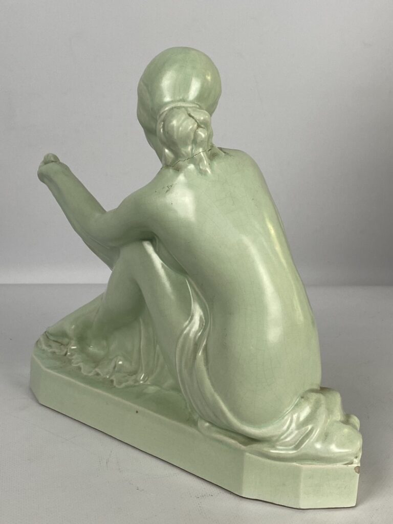 Louis FONTINELLE (1886-1964) - Faïence polychrome représentant une femme dénudé…