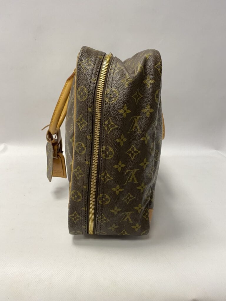 LOUIS VUITTON une valise souple modèle Sirius 45cm. - Toile monogrammée, cadena…