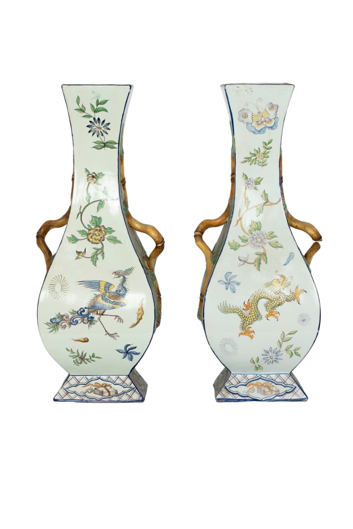 Manufacture de SAINT-CLEMENT - Paire de vases en faïence à panses balustres à q…