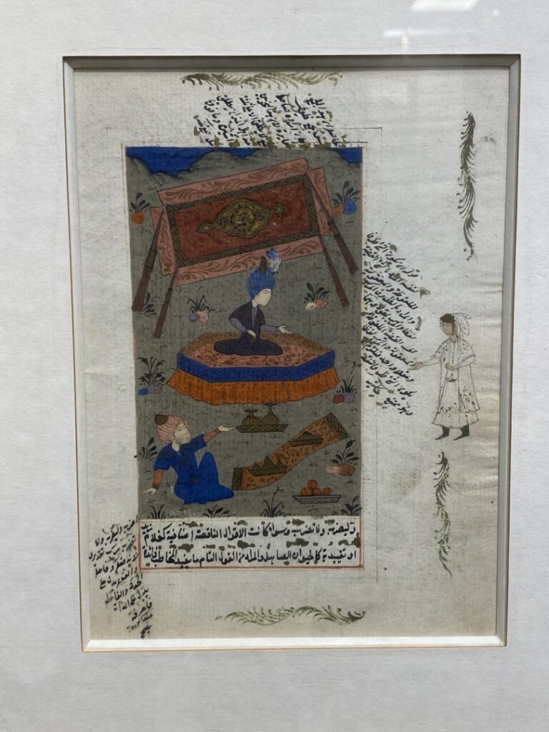 Miniature persane peinte à la gouache sur papier, représentant une scène animée…