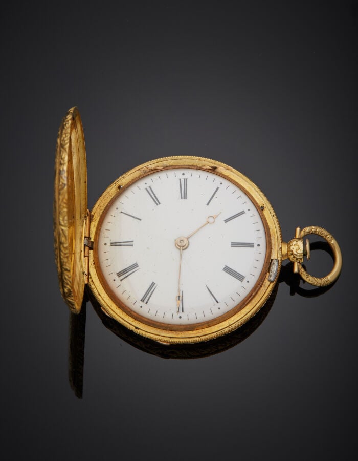 MONTRE de POCHE SAVONNETTE en or jaune (750‰) entièrement ciselé à motifs de vo…