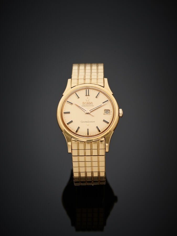 OMEGA - BRACELET MONTRE ronde modèle "Constellation" entièrement en or jaune (7…