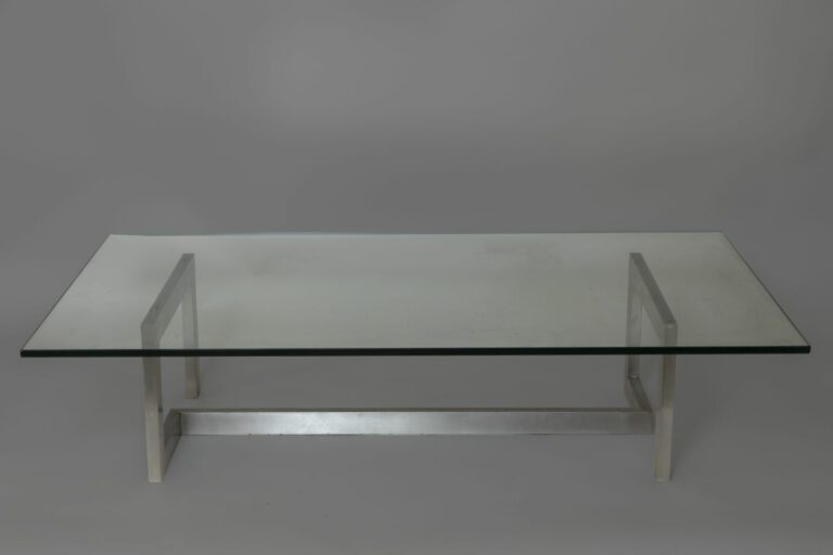 Paul LEGEARD (XXe siècle) - Table basse à plateau rectangulaire en verre reposa…
