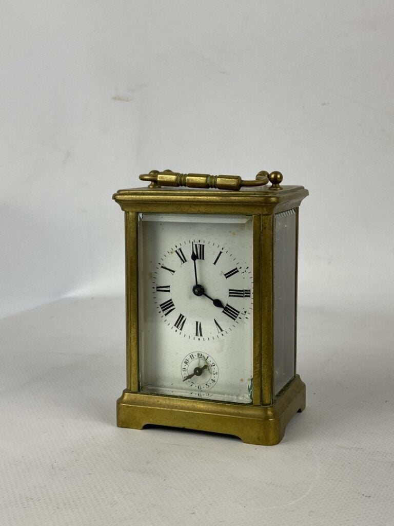 Pendulette d'officier à monture cage en bronze et métal doré - Le cadran émaill…