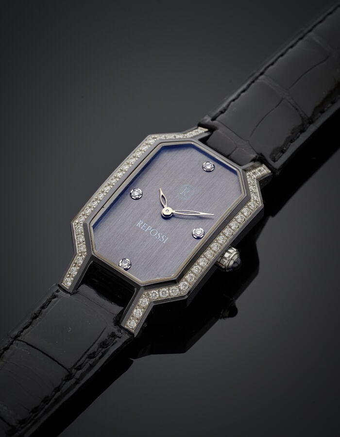 REPOSSI - BRACELET MONTRE octogonale de dame en acier et acier noirci. Lunette…