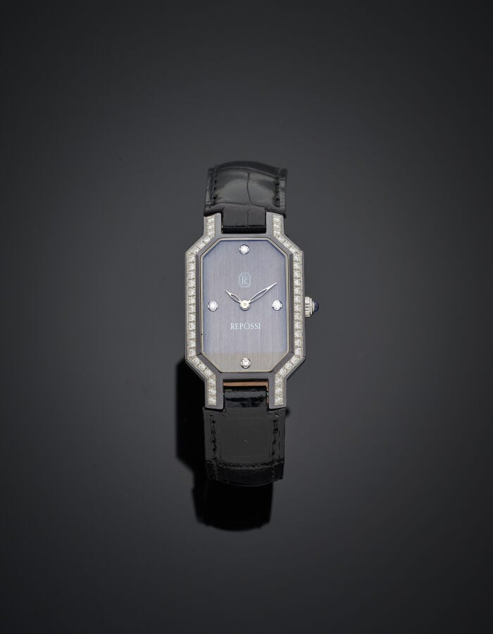 REPOSSI - BRACELET MONTRE octogonale de dame en acier et acier noirci. Lunette…