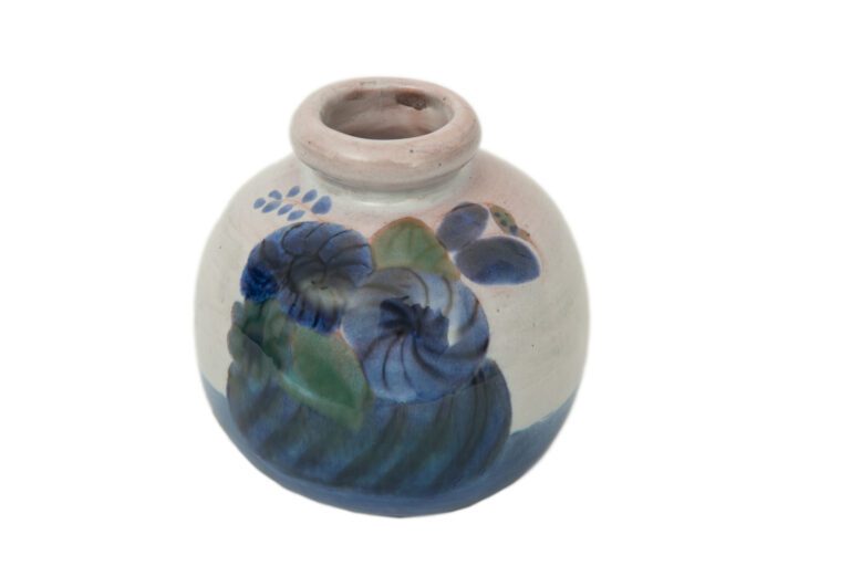 Robert et Jean CLOUTIER (XXème siècle). - Vase de forme boule à décor d'un pani…