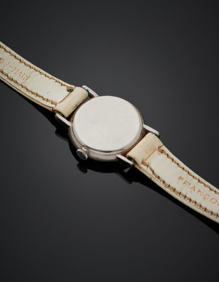UNIVERSAL pour HERMES - BRACELET MONTRE ronde de dame en acier. Cadran blanc, c…