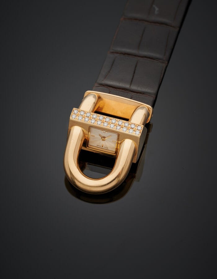 VAN CLEEF & ARPELS - BRACELET MONTRE de dame "Cadenas" en or jaune (750‰). Le b…