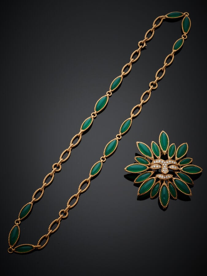 VAN CLEEF & ARPELS - SAUTOIR et PENDENTIF-CLIP de CORSAGE "soleil" en or jaune…