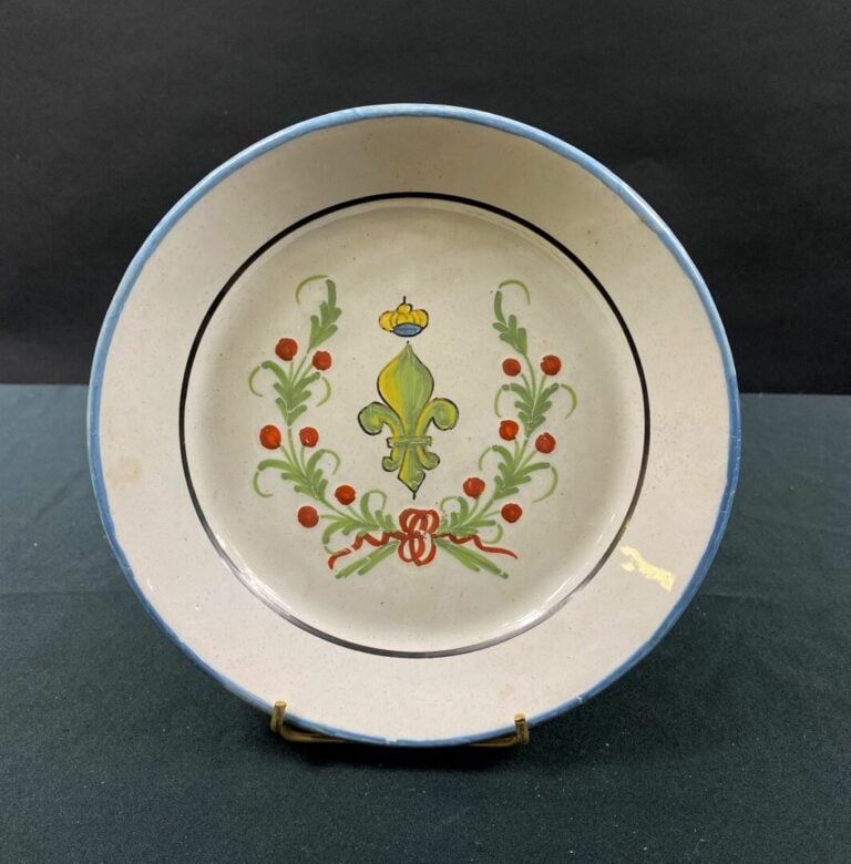 WALY (attribuée à) - Assiette à décor polychrome révolutionnaire d'une fleur de…
