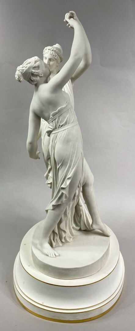 SEVRES - Grand groupe de "La Danse" sur socle circulaire à décor émaillé blanc,…