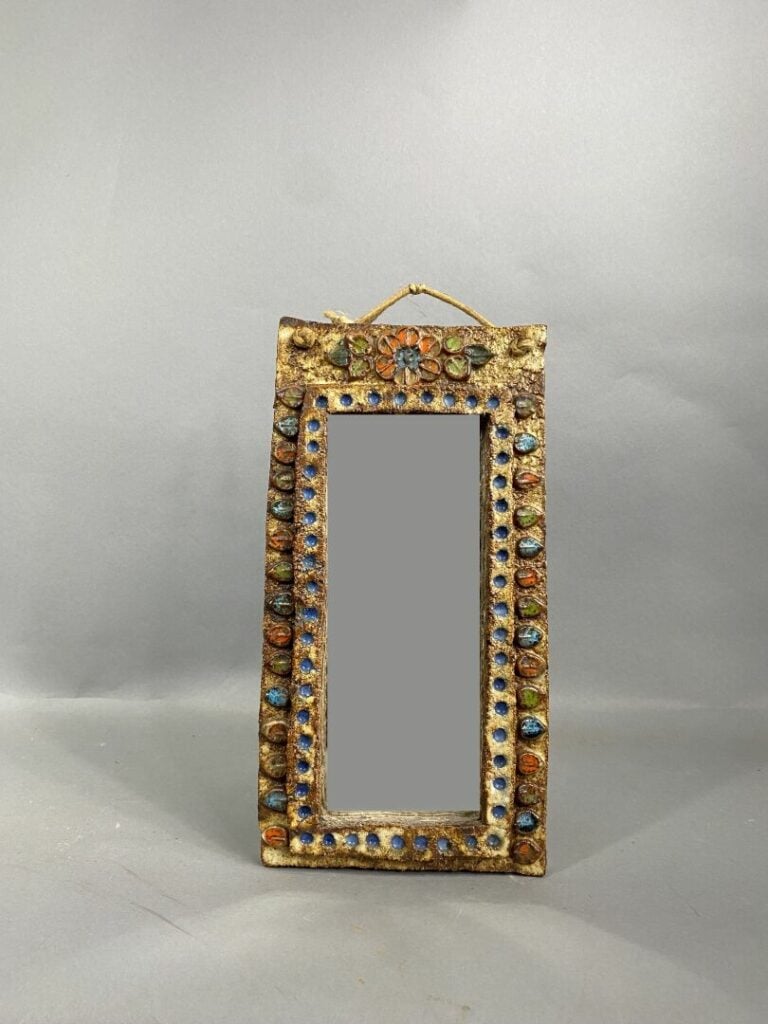 VALLAURIS - Miroir en grès émaillé à décor de pétales en creux en polychromie -…