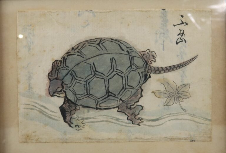 Japon - Lot de trois petites estampes découpées et encadrées représentant une g…
