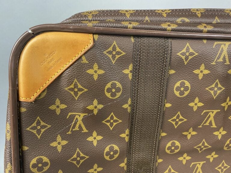 Louis VUITTON - Valise "Satellite" 60 cm, demi souple en toile monogram et cuir…