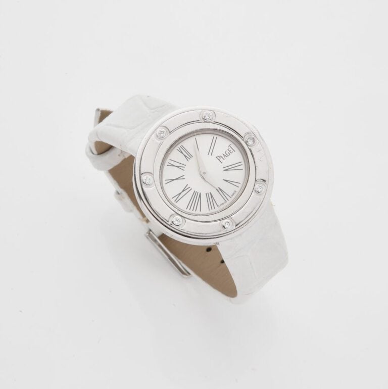 PIAGET, Possession vers 2013 - Montre bracelet de dame, boîtier rond en or gris…