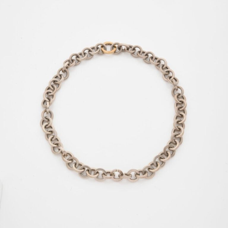TIFFANY & Co - Collier articulé en argent (925) à maille jaseron centré d'un an…