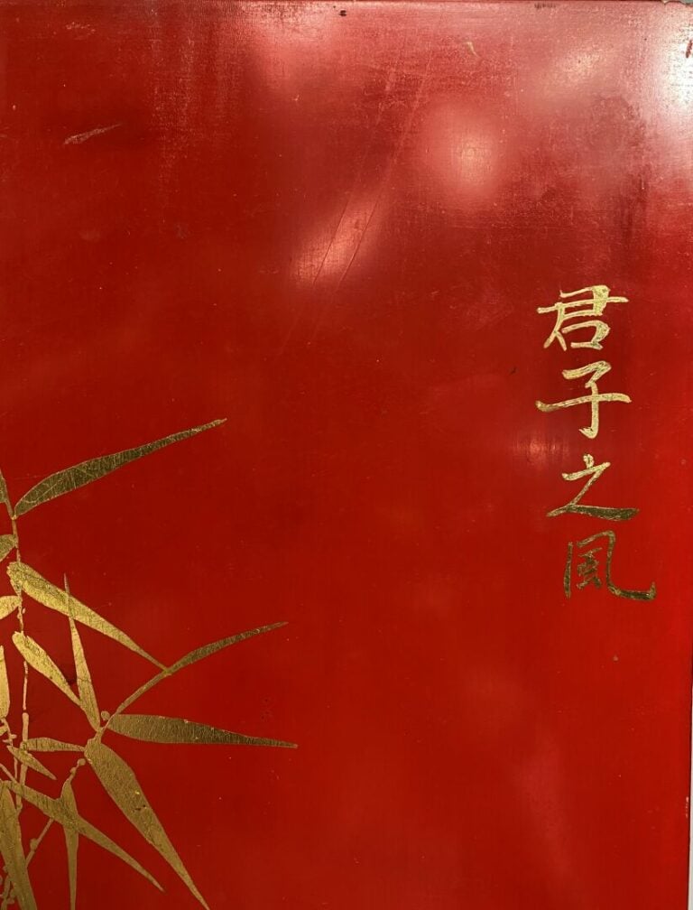 Vietnam, XXe siècle - Panneau de bois laqué rouge à décor d'une bambouseraie do…