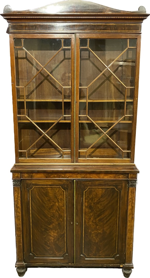 Meuble deux corps en bois et placage d'acajou, ouvrant en partie basse par deux…