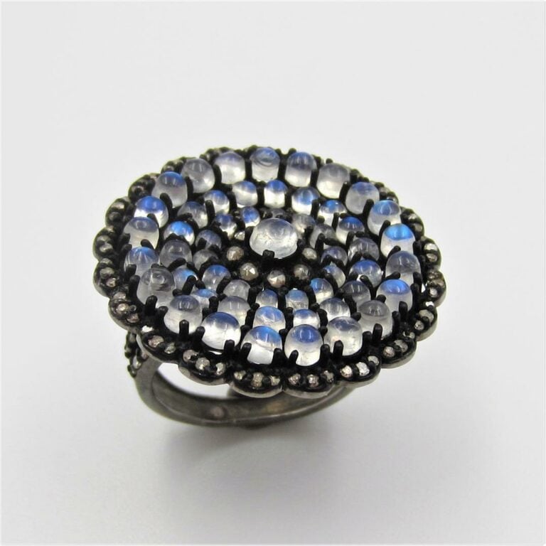 Importante BAGUE " fleur " en en or jaune (750 millièmes) et argent (925 milliè…