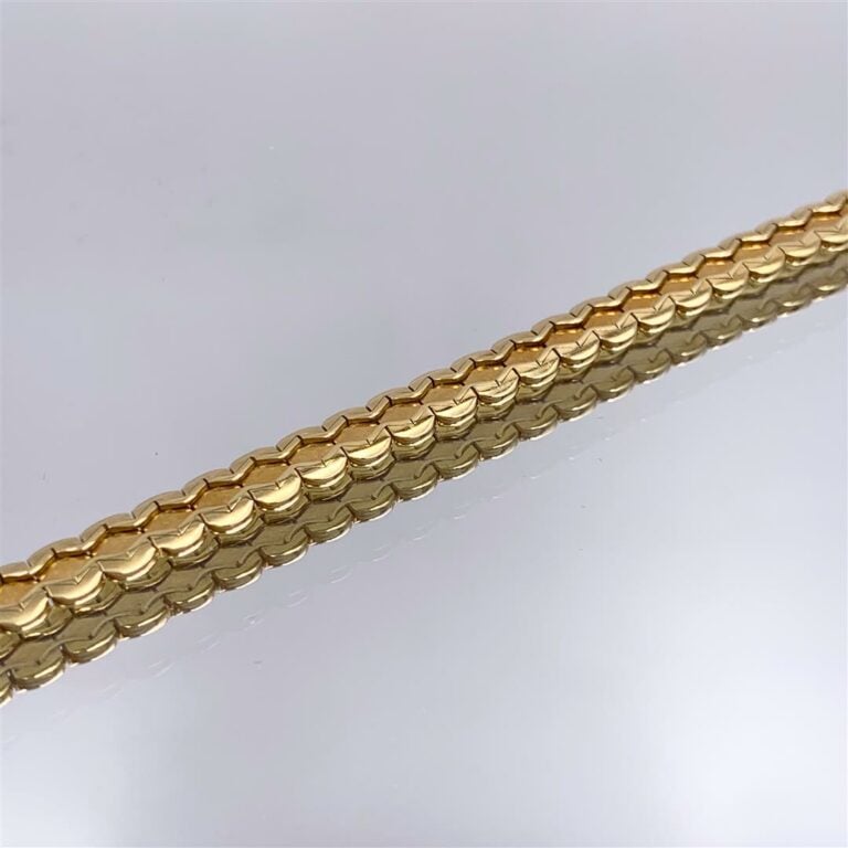 COLLIER en or jaune (750 millièmes) à maille plate, à motifs de vagues. - Long.…