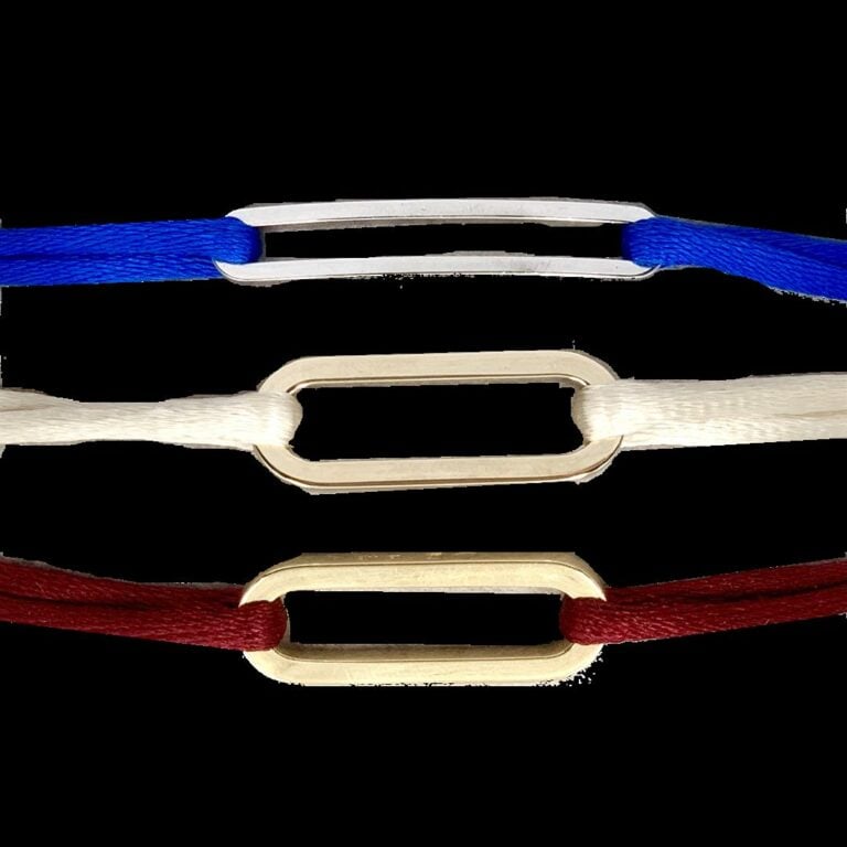 DINH VAN - Trois BRACELETS, modèles « Maillon » en or jaune, or rose et or gris…
