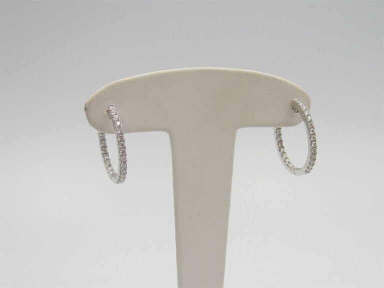 Paire de BOUCLES d'OREILLES "créoles" en or gris (750 millièmes) serti d'aligne…
