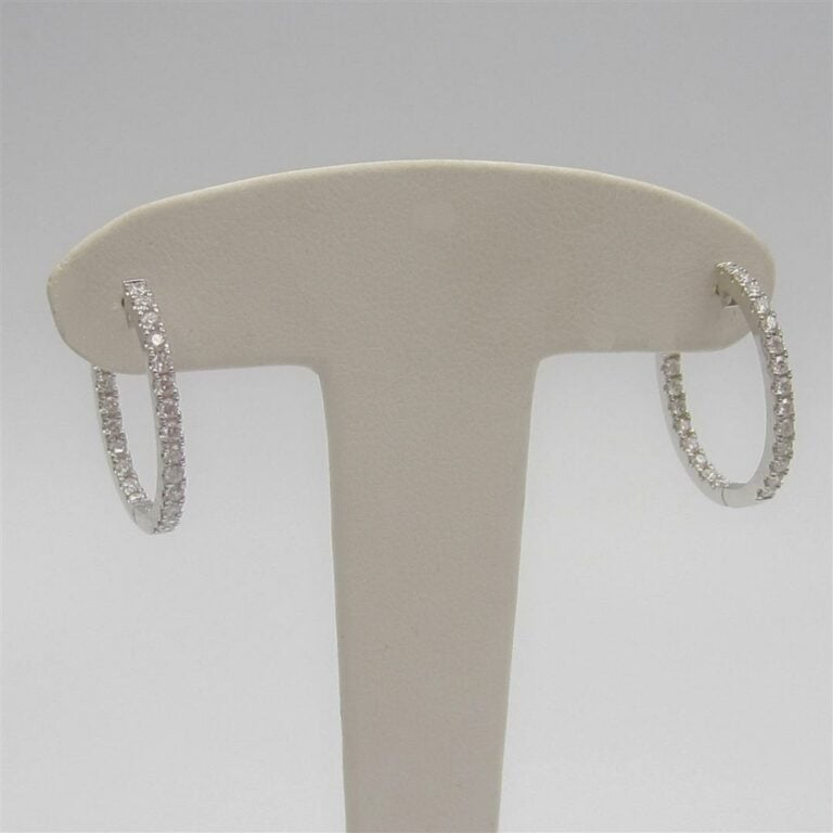 Paire de BOUCLES d'OREILLES "créoles" en or gris (750 millièmes) serti d'aligne…
