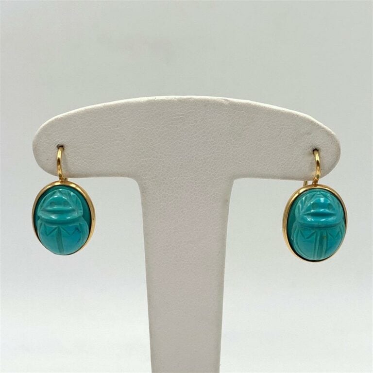 Paire de BOUCLES d'OREILLES « dormeuses » en or jaune (750 millièmes) orné de t…