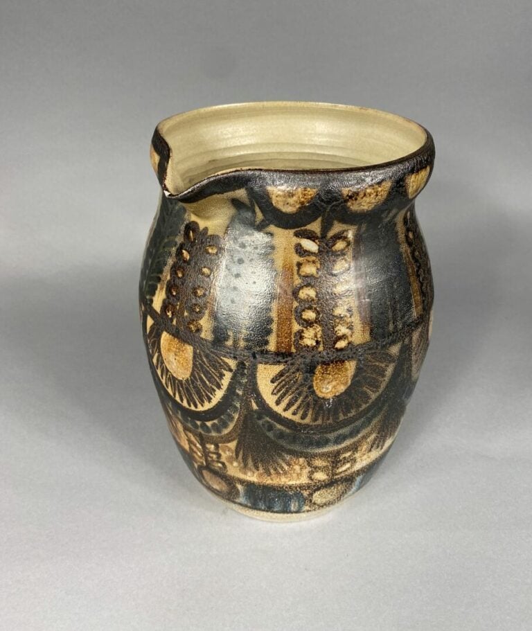COURJAULT Keraluc - Pichet en céramique émaillée à décor de motifs stylisés dan…