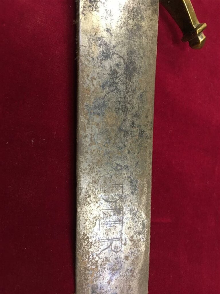 Sabre d'infanterie dit "briquet", modèle de 1767, poignée en laiton, marqué sur…