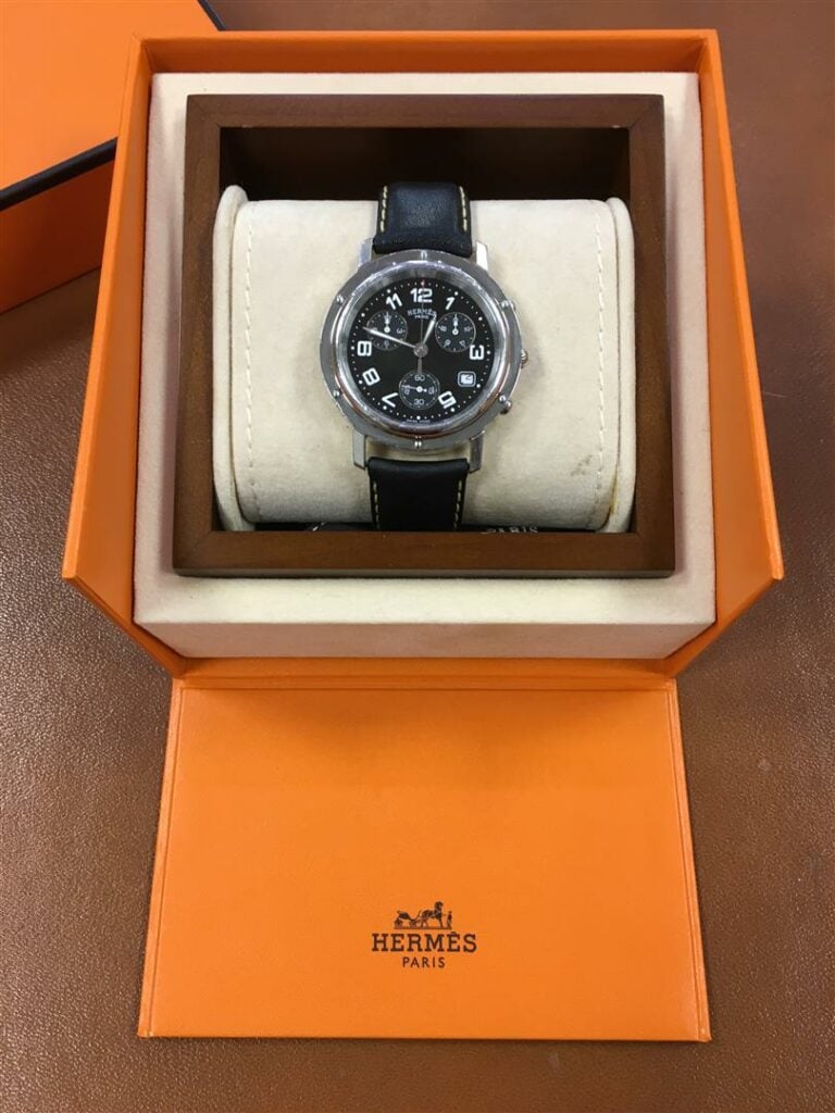 HERMES. - Montre-bracelet d'homme formant chronographe, boitier en acier signé…