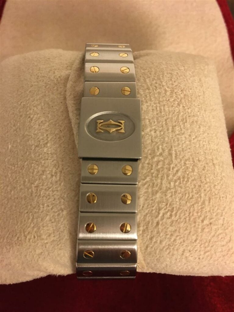 CARTIER. - Montre-bracelet SANTOS GALBEE Grand Modèle, acier et or, mouvement à…