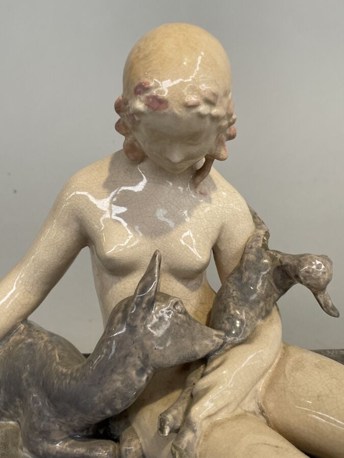 GROUPE en plâtre émaillé représentant une femme nue, une biche et son enfant. P…