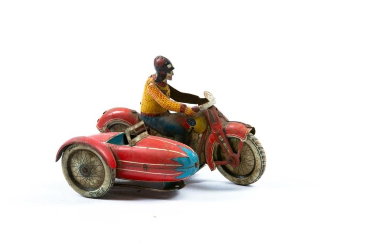 Side-car mécanique en tôle lithographiée (manque la clef de remontage, légères…