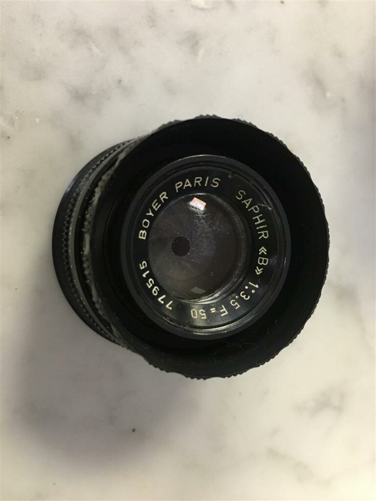 Appareil photo MINOLTA SR T 101, avec son objectif 1:3,5-4,5 ZOOM 28-85 mm. - O…