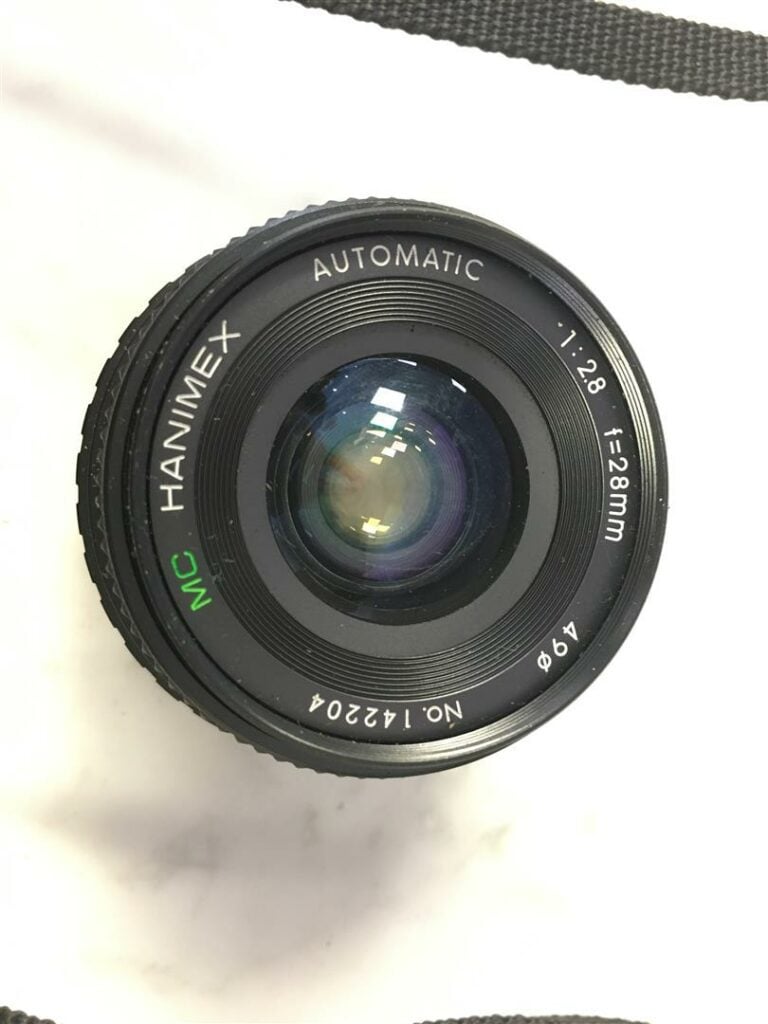 Appareil photo CANON AE-1, avec son objectif 1:1.8/50 mm. - On y joint un objec…