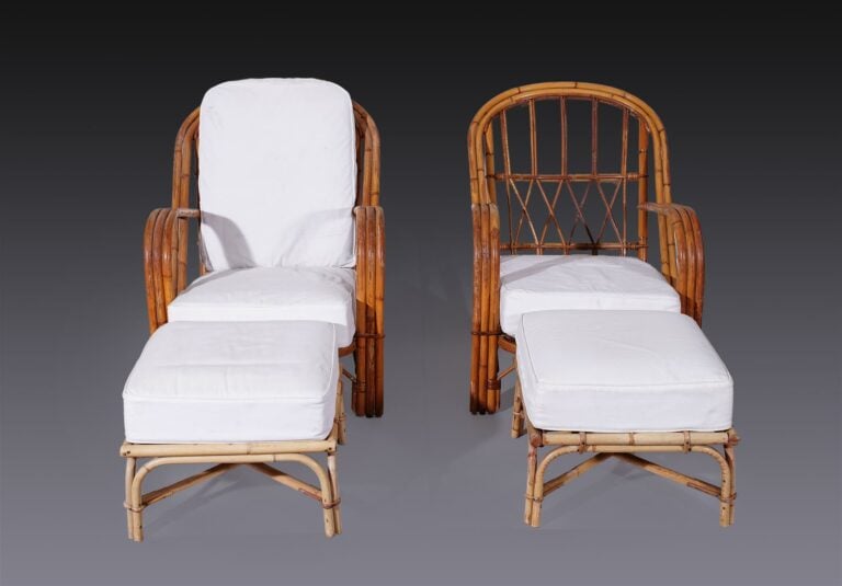 AUDOUX-MINET. - Paire de fauteuils et leur repose-pied, structure en rotin garn…