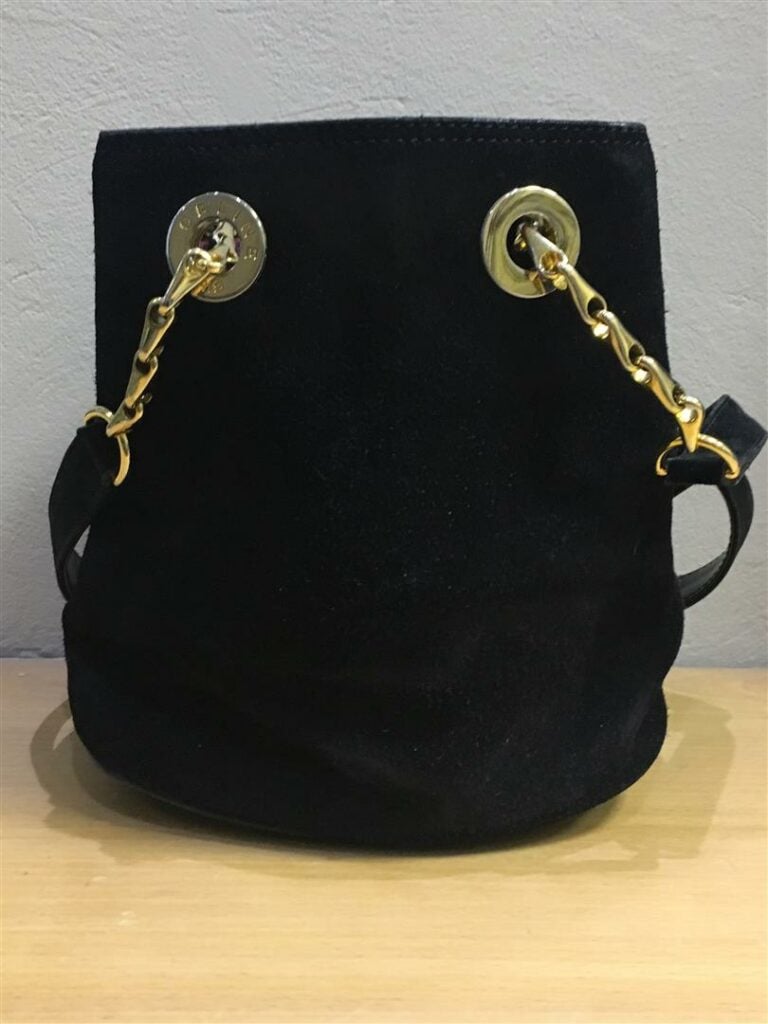 Petit sac bourse CELINE en peau noire, double anse chaîne dorée et cuir, intéri…