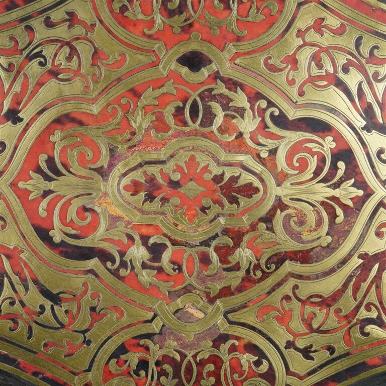 Jardinière en bois noirci et marqueterie Boulle, le plateau marqueté découvrant…