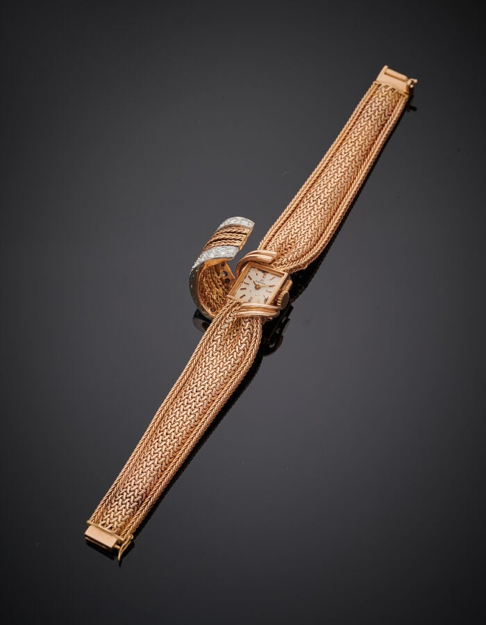 BLANCPAIN - UTI - BRACELET MONTRE « noeud » de dame en or jaune (750‰). La mont…