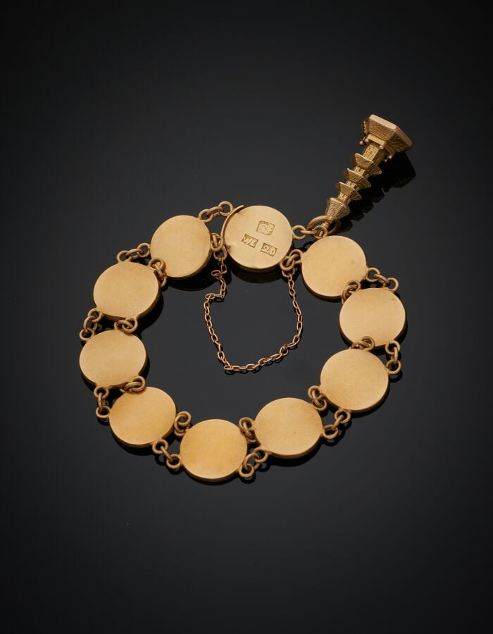 BRACELET articulé en or jaune (750‰) composé de dix éléments circulaires portan…