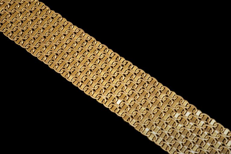 Bracelet ruban en or jaune 18K (750°/oo) à maillons souples en forme de double…
