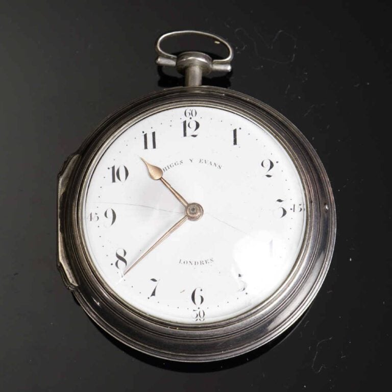 HIGGS & EVANS, LONDRES - Montre oignon en argent (925°/oo). Cadran émaillé sign…