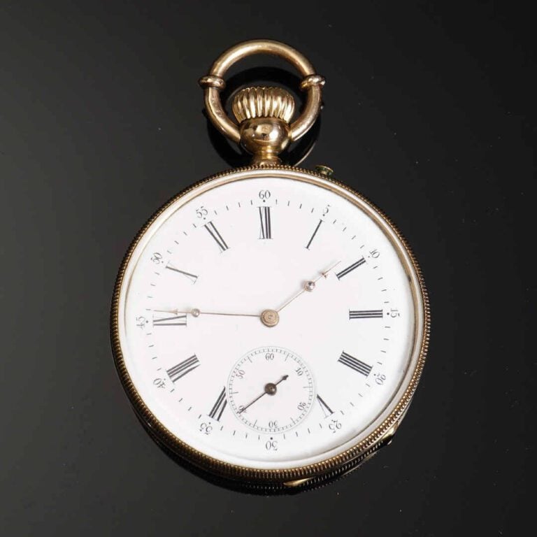Montre de gousset en or jaune 18K (750°/oo). Cadran émaillé, indication des heu…