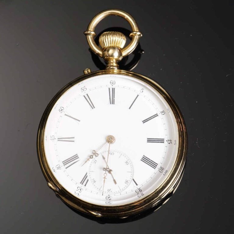 Montre de poche en or jaune 18K (750°/oo). Cadran émaillé, à indication des heu…