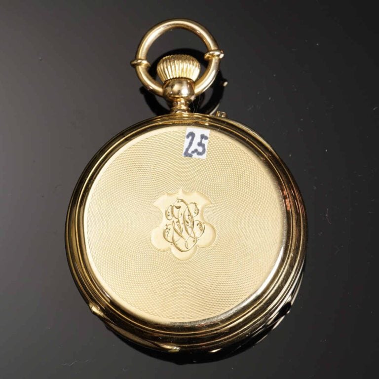 Montre de poche en or jaune 18K (750°/oo). Cadran émaillé, à indication des heu…
