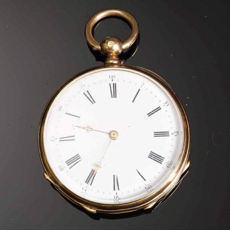 Montre de poche en or jaune 18K (750°/oo). Cadran émaillé, à indication des heu…