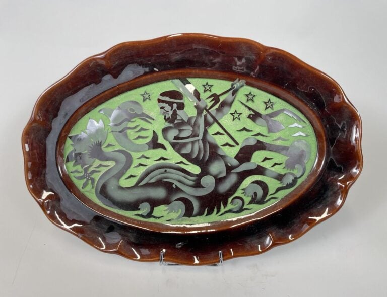 Robert MEQUINION (1905-1985) - Plat ovale en céramique émaillée à bords chantou…