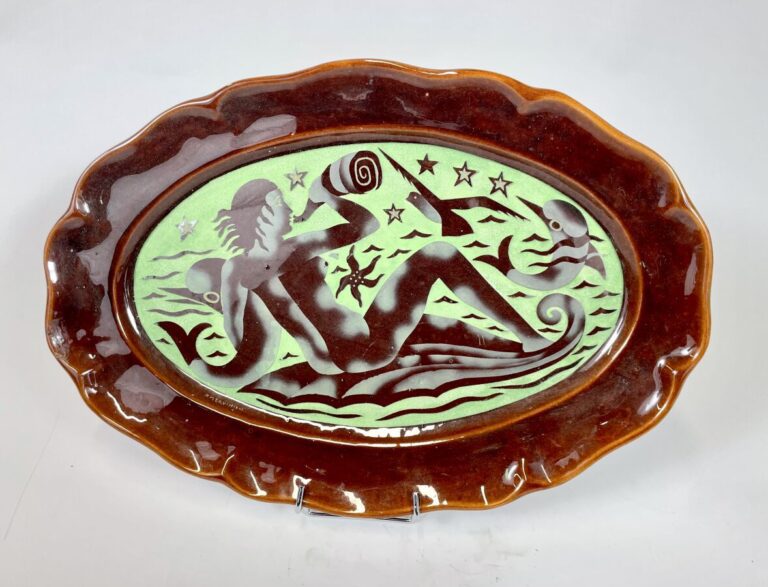 Robert MEQUINION (1905-1985) - Plat ovale en céramique émaillée à bords chantou…